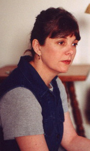 Woman sitting pensively