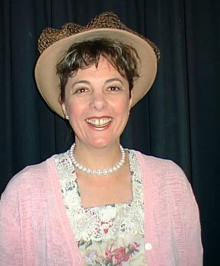 Woman smiling at the camera.