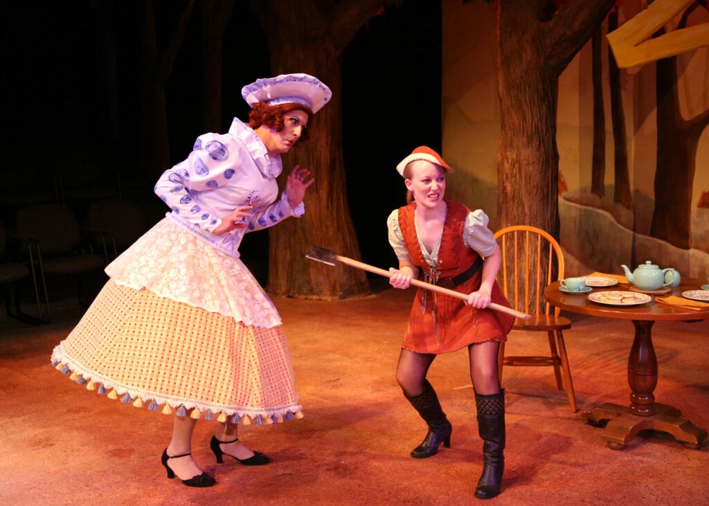 Kevin Keating as Mother Hood, Danielle Pickard as Charlie The Chopper. 'Little Red Riding Hood' by Jackie Mellor-Guin. Photo: Mark Trew.