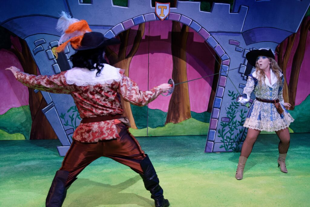 Athos & D'Artagnan swordfighting.
